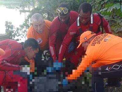  Defensa Civil recupera cuerpo de motorista que cayó al río Isabela